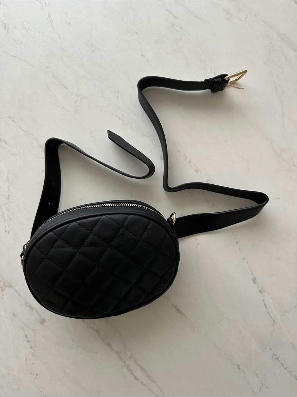Black Quilted Oval Crossbody Bag